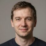 Улыбающийся Алексей Морозов, один из пользователей сервиса Freelitecoin, получивший бесплатные токены Litecoin